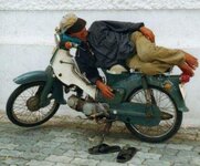 sleepin_on_motorcycle.jpg