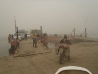 boarding ferry in the smoke.jpg