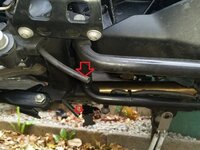 under the bike with arrows.jpg