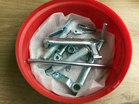 01 Rearsets re zinc plated in tub.jpg
