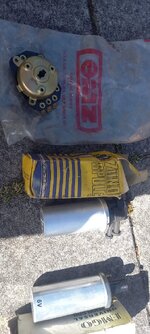TS 250 ignition switch and one OE and one after market coil.jpg