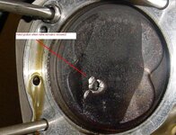 hole in piston.jpg