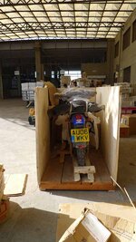 Sue's bike being crated.jpg