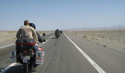 Iranian security on pillion.jpg